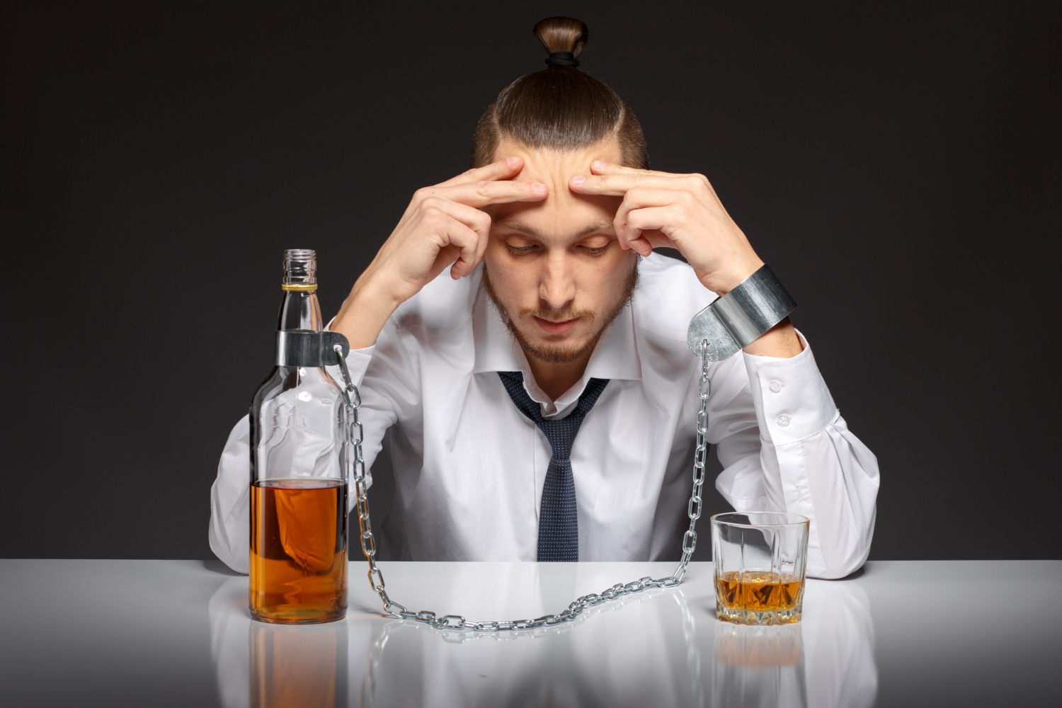 addicted man thinking about his problems