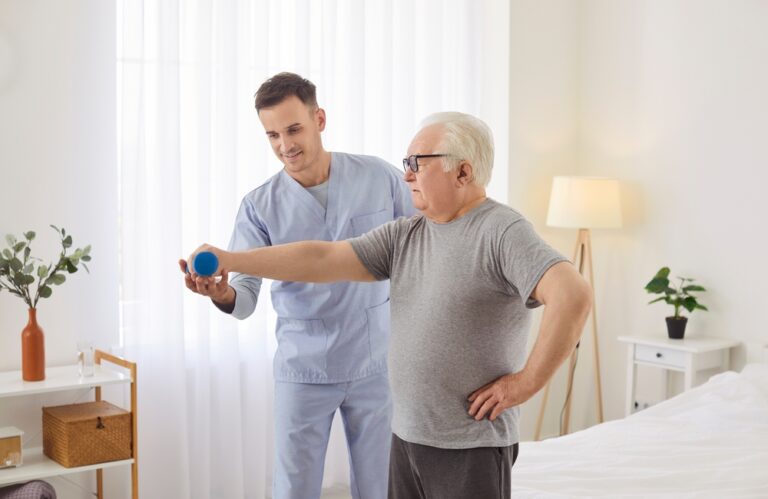 chubby,old,pensioner,man,patient,doing,therapeutic,rehab,exercise,with