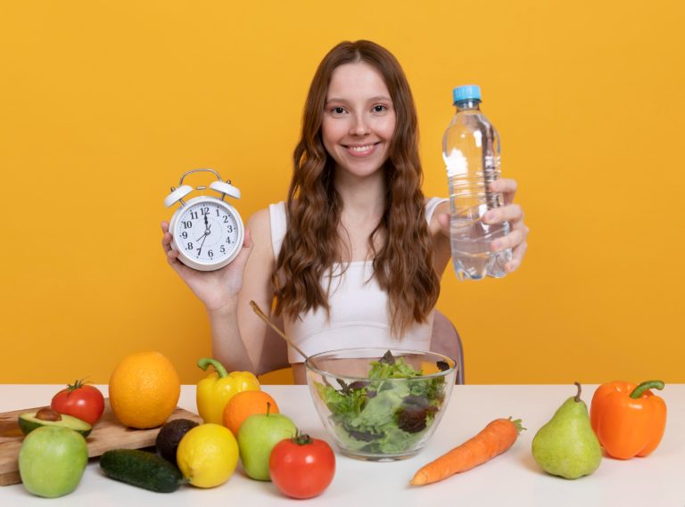 medium shot woman with vegetables water (1)