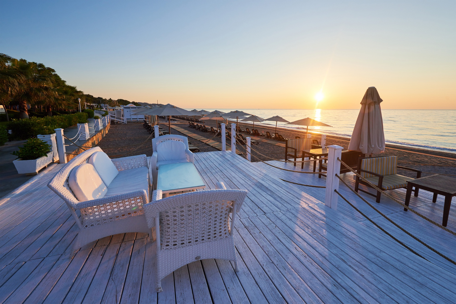 scenic view sandy beach beach with sun beds umbrellas open against sea mountains hotel resort tekirova kemer turkey